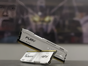 Two RAM modules with 'FURY' branding on a blurred background