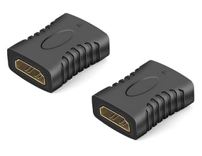 Two black HDMI connectors on a white background