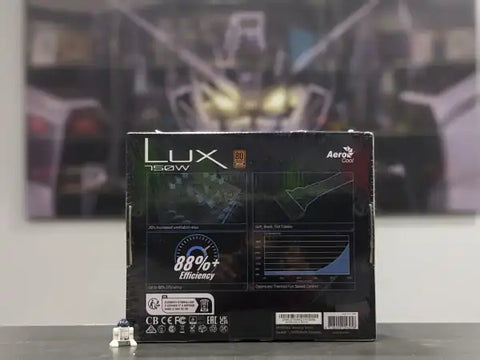 Lux 150W power supply box with branding on a blurred background