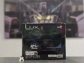 Lux 150W power supply box with branding on a blurred background