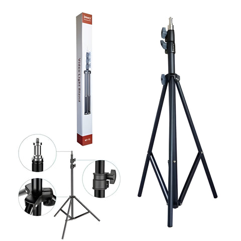 Black tripod stand with packaging and additional attachments on a white background