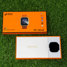 Orange packaging box for a smart watch on grass