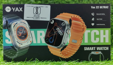 YAX smart watch packaging with two different watch faces on a grass background