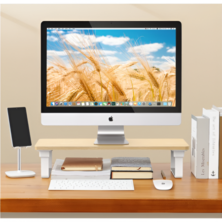 Computer setup on a desk with a monitor displaying a wheat field image.