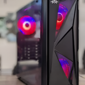 Glossy black computer case with RGB lighting on a blurred background