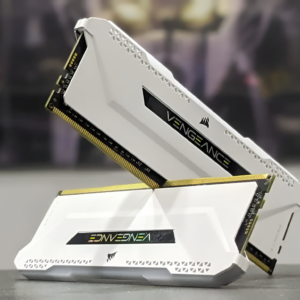 Corsair Vengeance RAM modules on a stand with a blurred background