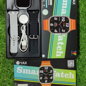 YAX smartwatch set with packaging on a grass background